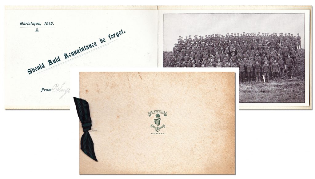 The front of the card shows the Battalion crest comprising a scroll with the Battalion name, a Tudor crown over the winged-maiden Irish harp, the Regimental motto Quis Separabit [Who shall separate (us)?], the bugle associated with rifle regiments and light infantry, and the descriptor ‘Pioneers’, the role of the Battalion. The interior had space for a photograph (in this case No. 2 Company). The card is tied with a black and green ribbon, the colours traditionally associated with rifle regiments.